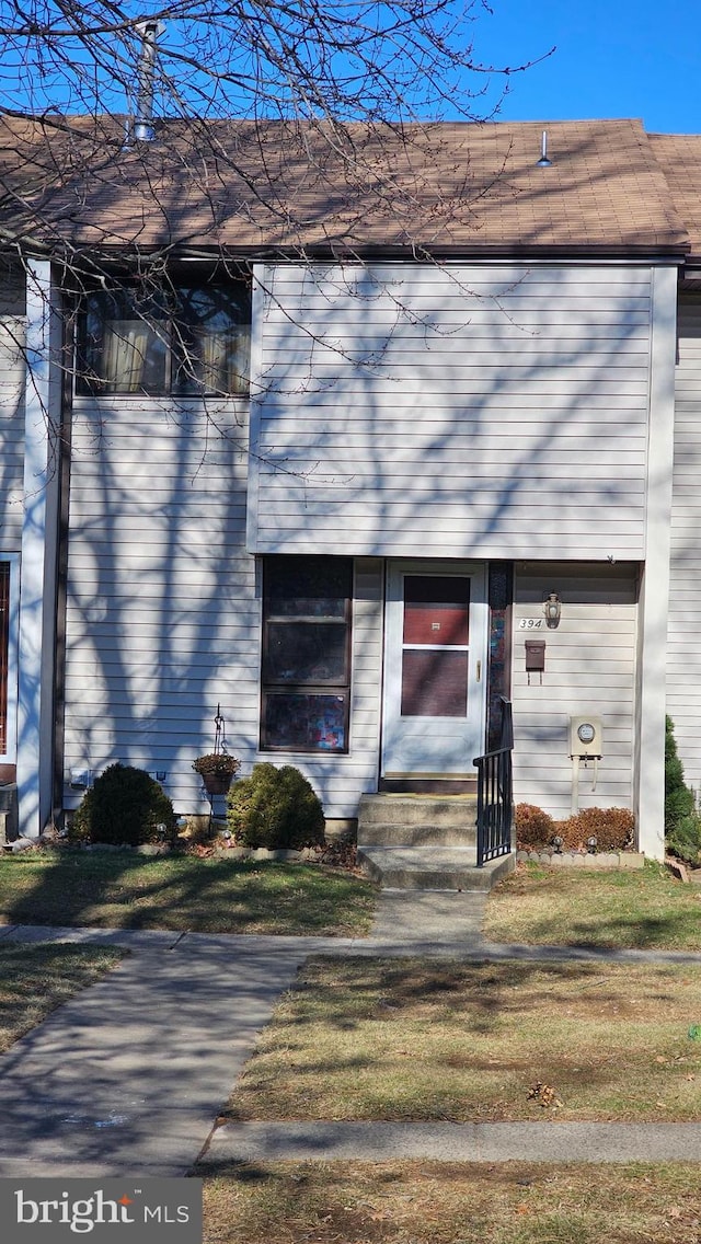 exterior space featuring a front lawn