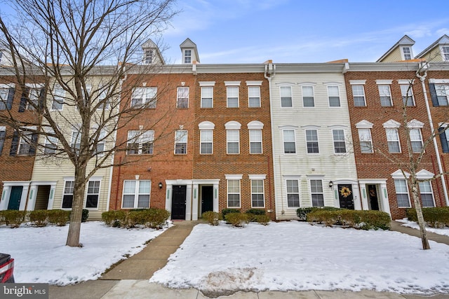 view of snow covered property