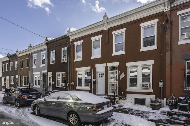 view of snow covered building