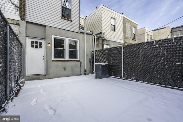 exterior space featuring central AC unit