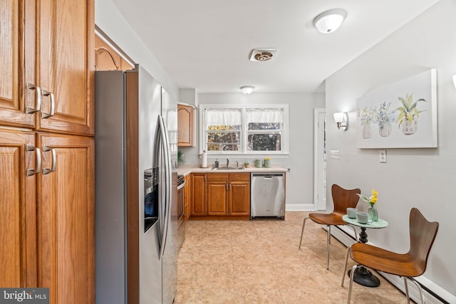 kitchen with sink and stainless steel appliances