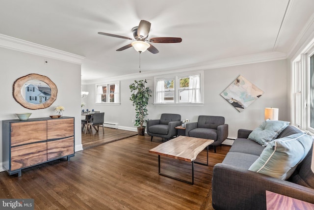 living room featuring ceiling fan with notable chandelier, dark hardwood / wood-style flooring, baseboard heating, and crown molding