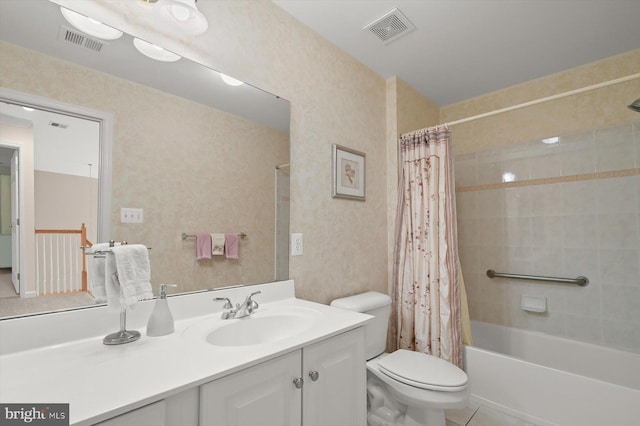 full bathroom with vanity, tile patterned flooring, toilet, and shower / bath combo