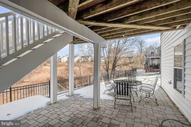 view of snow covered patio