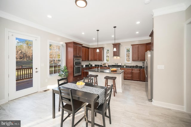 dining room with sink and crown molding