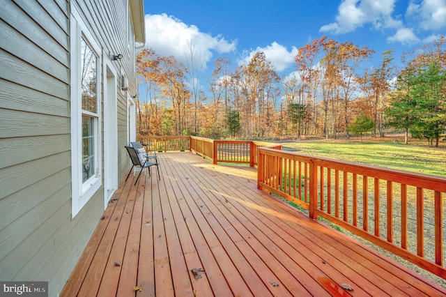 deck featuring a lawn