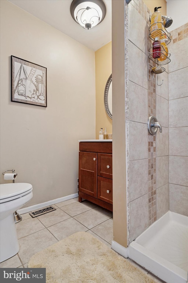 full bath featuring toilet, a shower stall, visible vents, and tile patterned floors