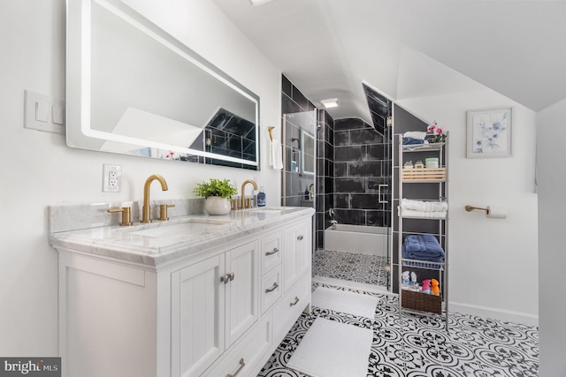 bathroom with walk in shower, tile patterned floors, and vanity