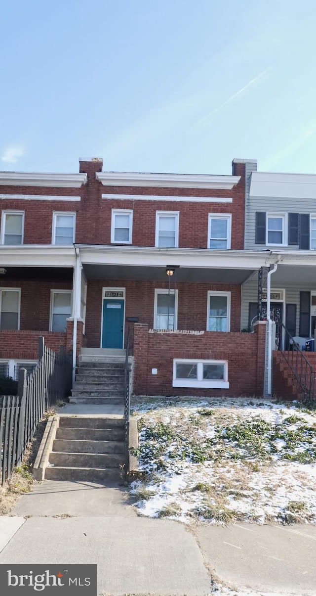 view of property with a porch