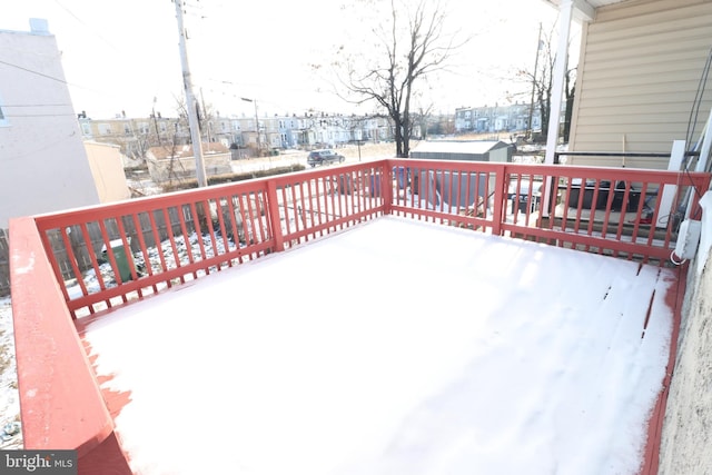 view of snow covered deck