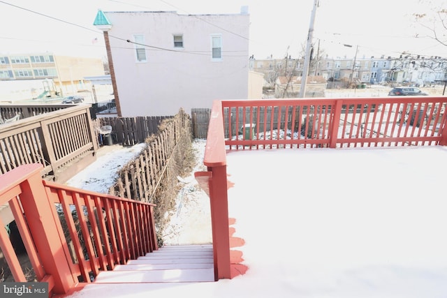 view of snow covered deck