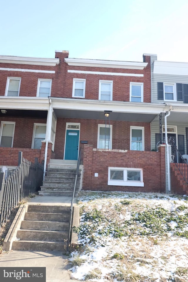 multi unit property featuring covered porch