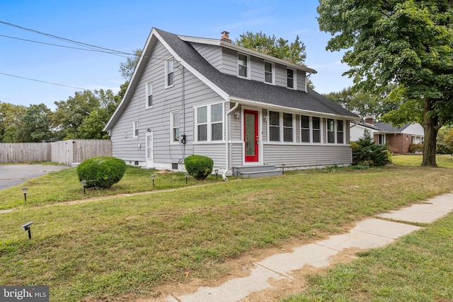 view of front of house with a front lawn