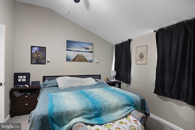 bedroom with lofted ceiling, ceiling fan, and light colored carpet