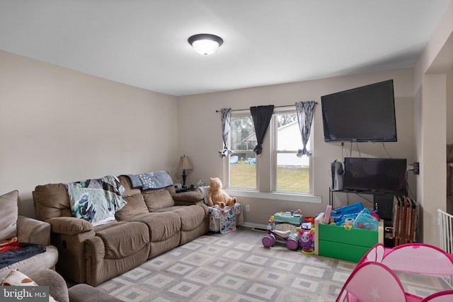 playroom featuring light colored carpet