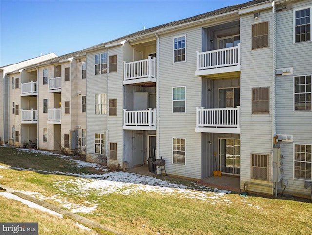 view of property with a wall mounted air conditioner