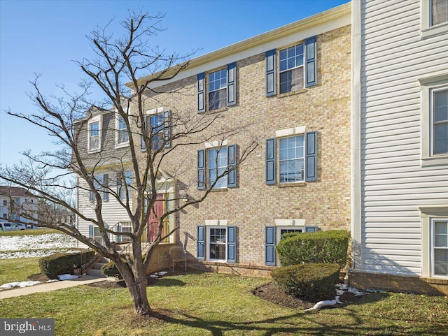 exterior space with a front yard