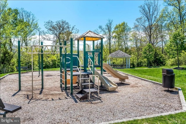 view of jungle gym featuring a yard and a gazebo