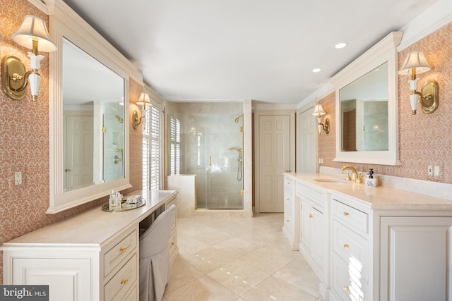 bathroom featuring a shower stall, vanity, and wallpapered walls