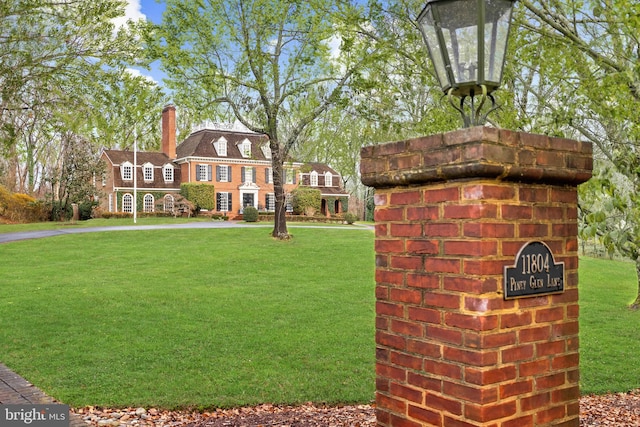 exterior space featuring a front lawn