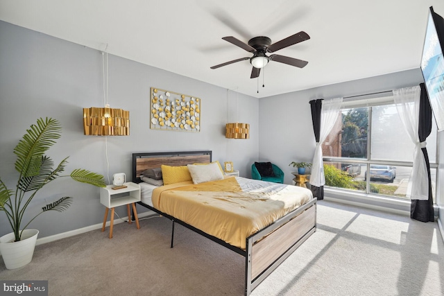 bedroom featuring carpet flooring and ceiling fan