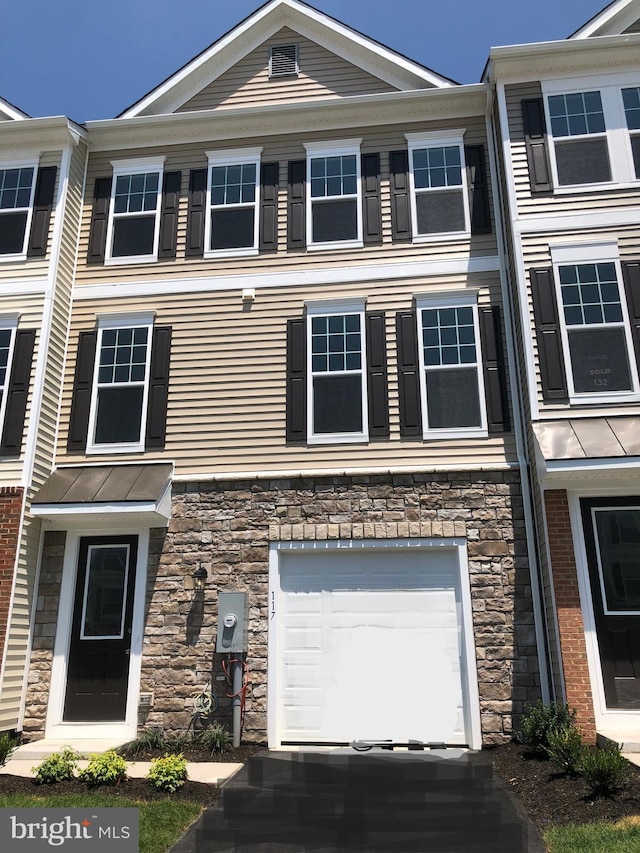 view of property featuring a garage