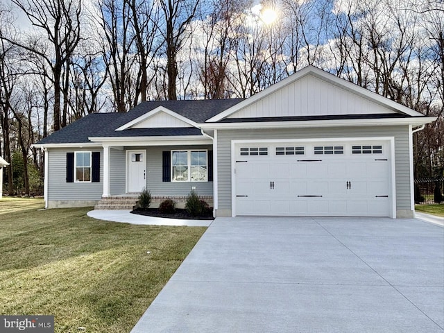 ranch-style home with a front lawn and a garage