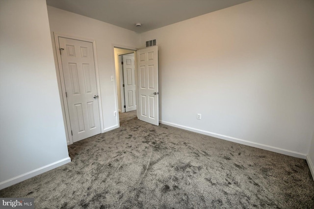 unfurnished bedroom featuring carpet flooring