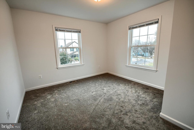 view of carpeted spare room