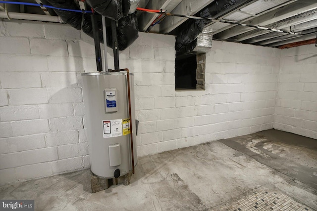 utility room with electric water heater