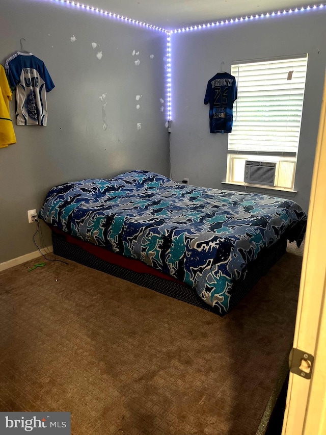 bedroom with carpet flooring and cooling unit