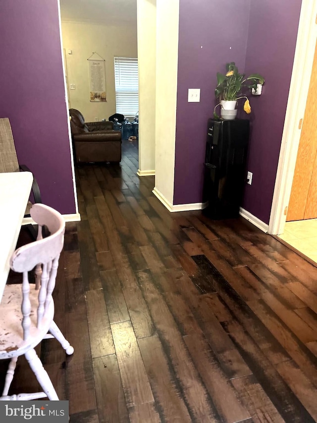 hall featuring dark wood-type flooring