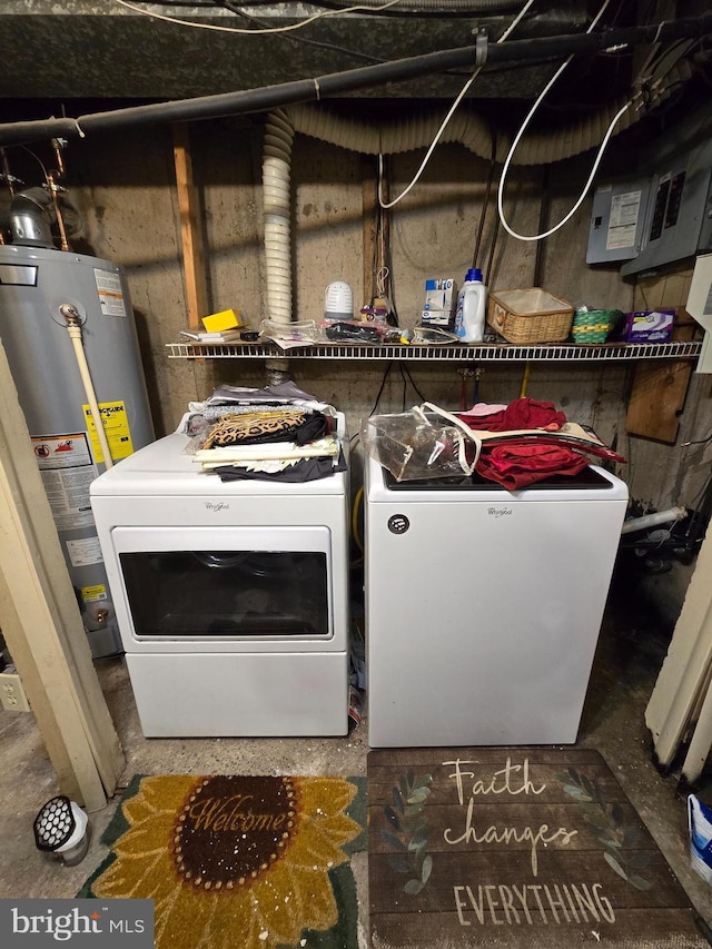 washroom featuring washer and dryer and water heater