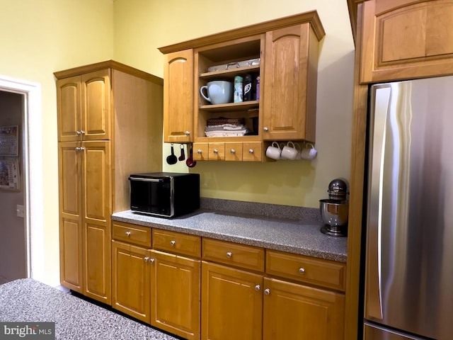 kitchen with stainless steel fridge