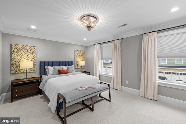 bedroom featuring crown molding and light colored carpet