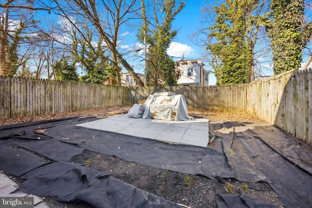 view of pool featuring a fenced backyard and a patio