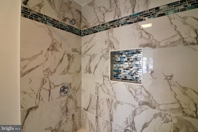 room details with a tile shower