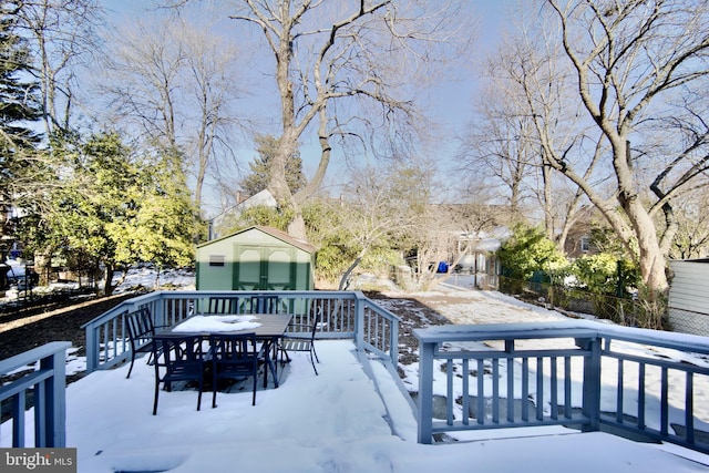 view of snow covered deck