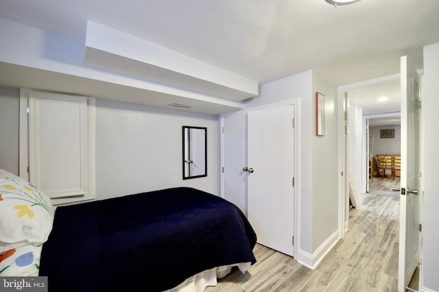 bedroom featuring light wood-type flooring