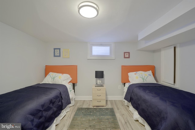 bedroom featuring light wood-type flooring