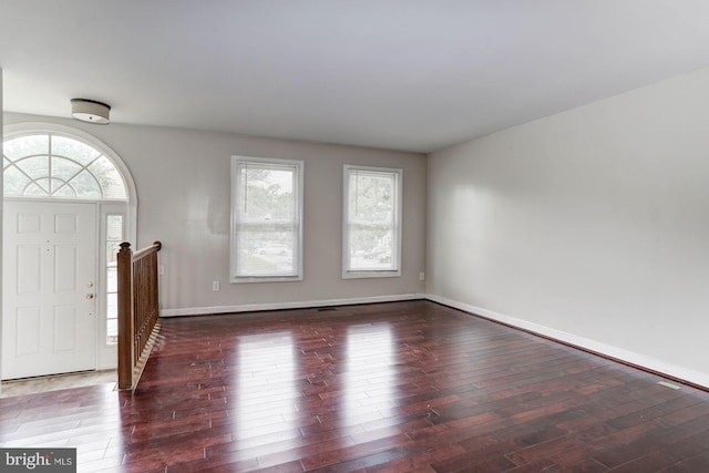 foyer with dark wood-type flooring