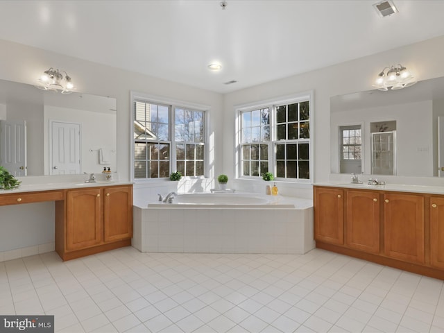 bathroom with vanity, tile patterned floors, and plus walk in shower