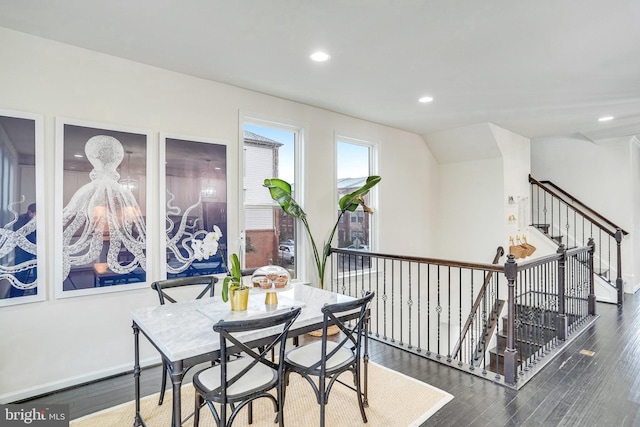 dining space featuring baseboards, dark wood-type flooring, and recessed lighting