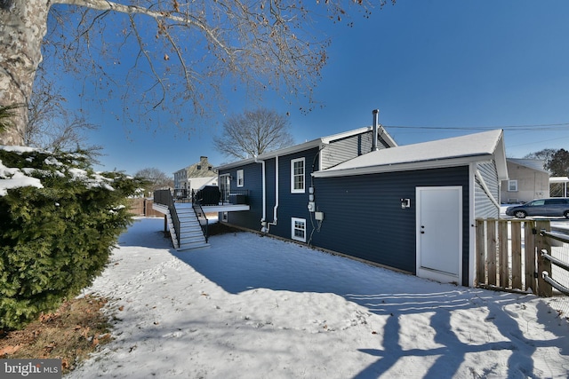 view of snow covered property