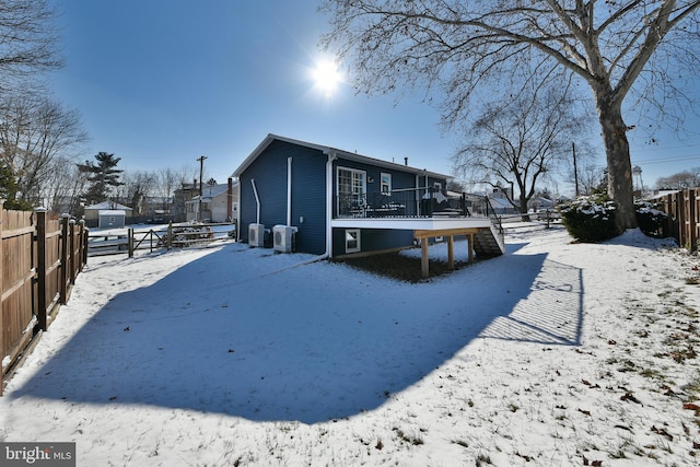 view of snow covered house