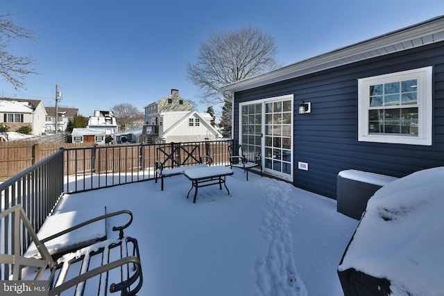 view of snow covered patio