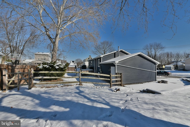 view of snow covered property