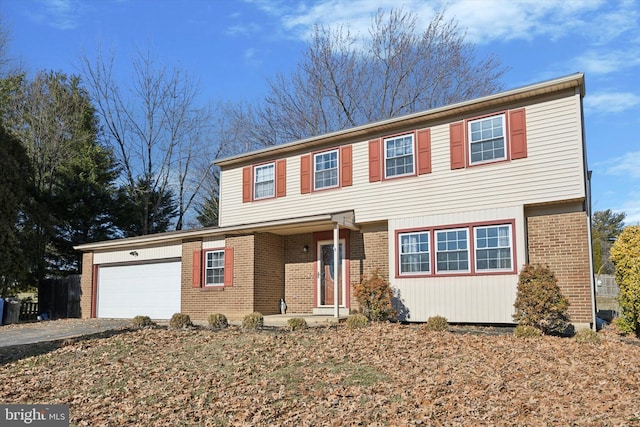 front of property featuring a garage