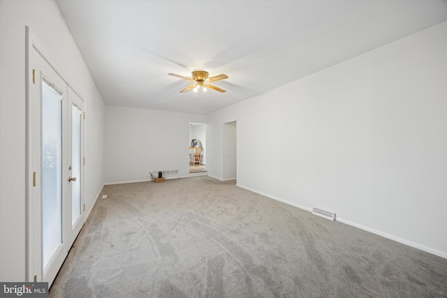 interior space with ceiling fan