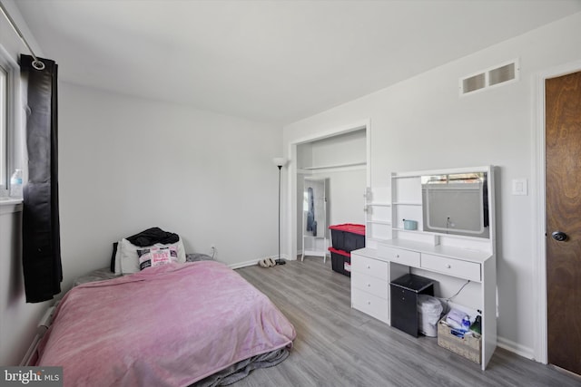 bedroom featuring light hardwood / wood-style floors